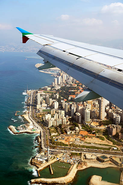 Beirut Aerial view of Beirut, capital of Lebanon showing the famous seaside promenade (the Corniche).You can see the new lighthouse at the photo. lebanon beirut stock pictures, royalty-free photos & images