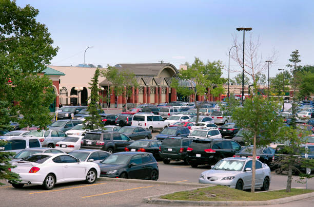 Cars parked at a shopping center stock photo