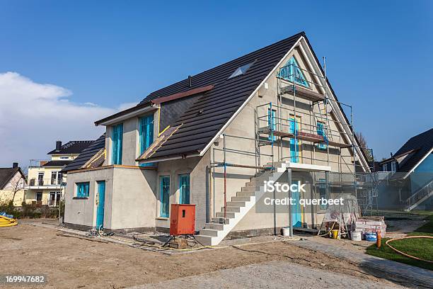 Einfamilienhausbaustelle Stockfoto und mehr Bilder von Baustelle - Baustelle, Wohnhaus, Baugewerbe