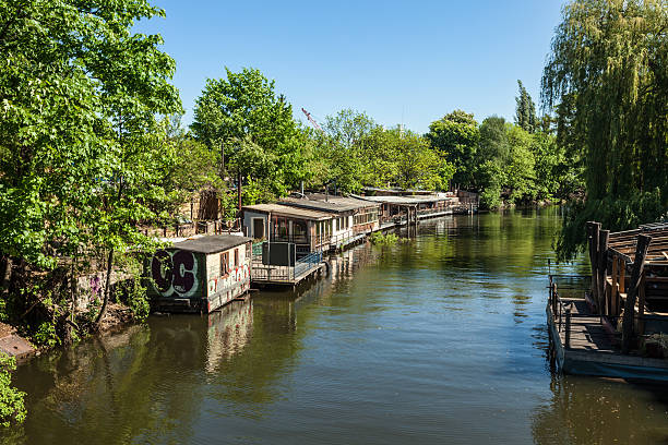 Wooden huts in Berlin. Club scene with restaurants. Wooden huts close to the river. spree river stock pictures, royalty-free photos & images