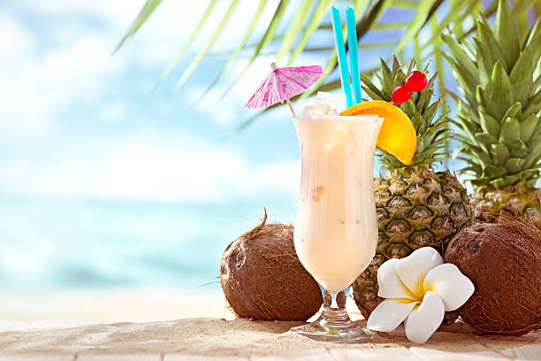 istock Pina Colada cocktail on the beach with copy space 169947794