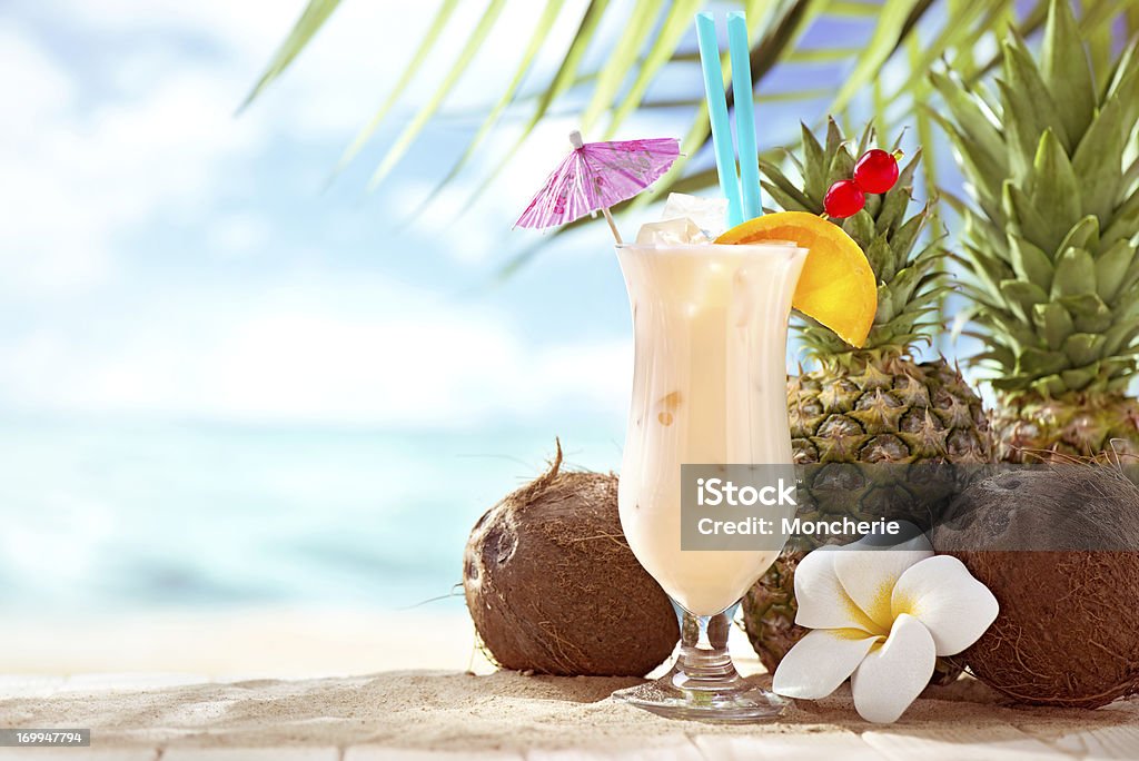 Pina Colada cocktail on the beach with copy space Pina Colada Stock Photo