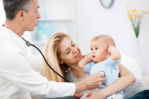 istock Pediatrician checking baby patient. 169949483