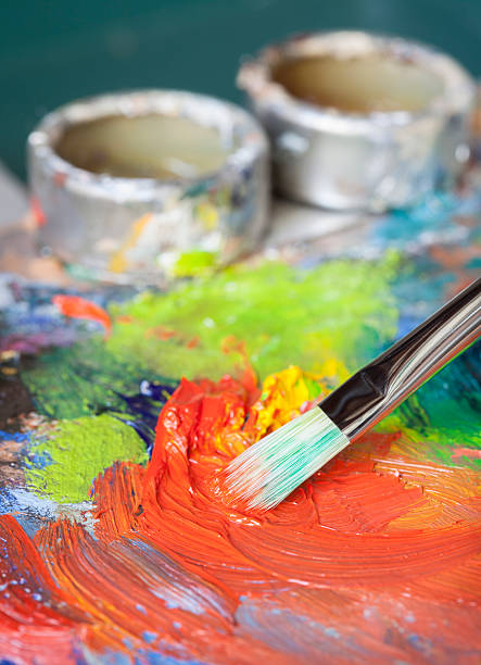 istock Paintbrush on a classical palette with oil cup 169949699