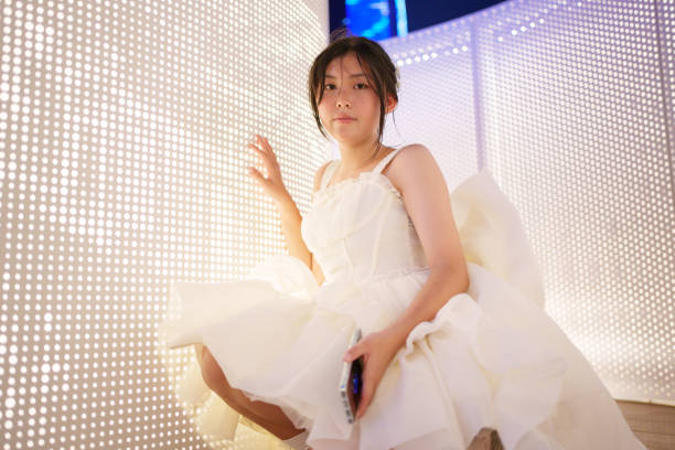 young woman in white dress