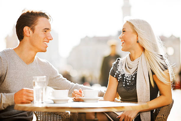 istock Beautiful couple sitting in a cafe. 169949915