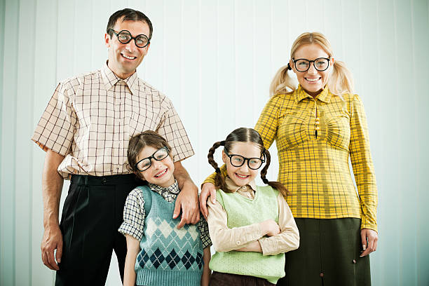 istock Embraced nerd family looking at the camera. 169950123
