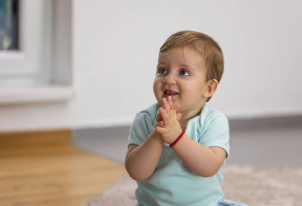istock Cute baby girl making funny expression 1699504784