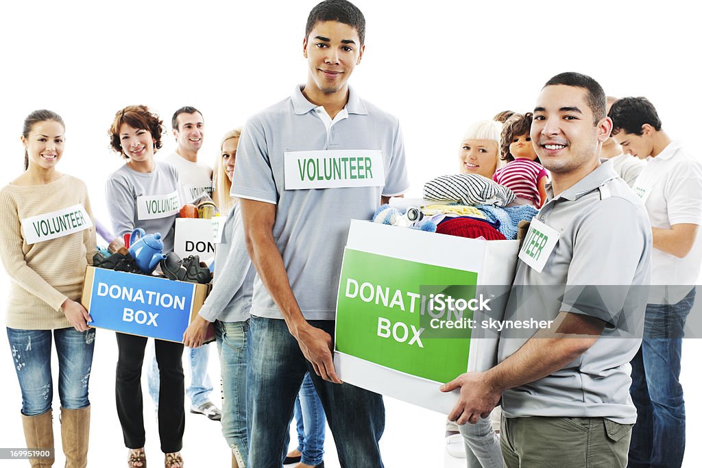 Grupo de voluntários segurando caixas de doação. - Royalty-free Adulto Foto de stock
