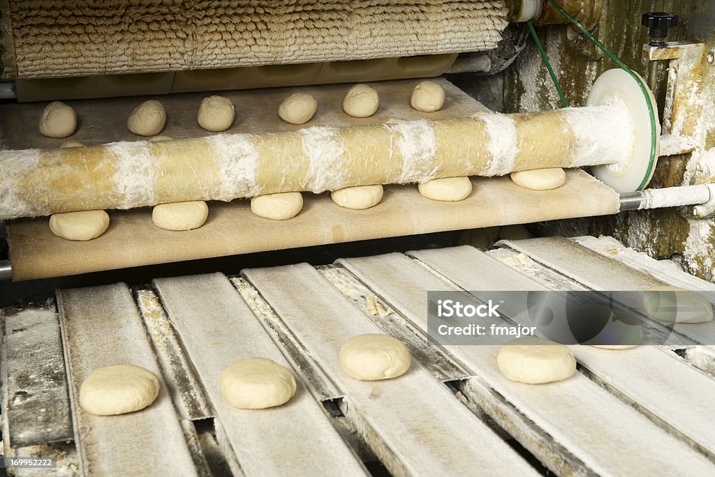 Production line of burger breads Production line and Semi-finished products in the bakehouse Bread Stock Photo