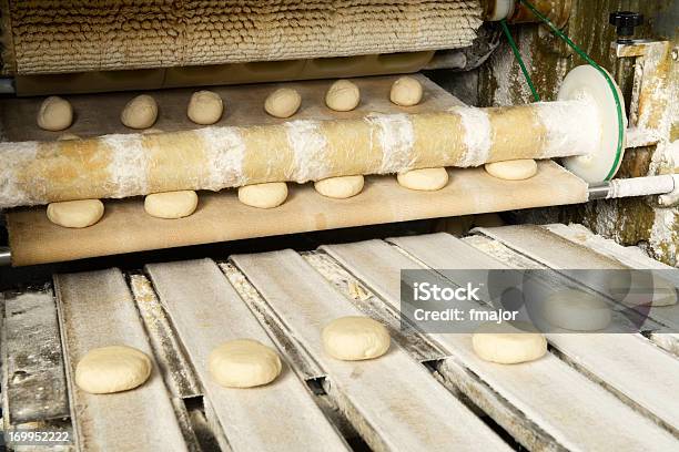 Production Line Of Burger Breads Stock Photo - Download Image Now - Bread, Machinery, Ambient Light