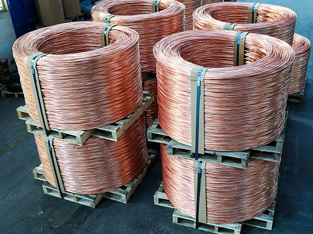 Wire Rod Coil on wooden pallets, fixed by steel straps copper cable stock pictures, royalty-free photos & images