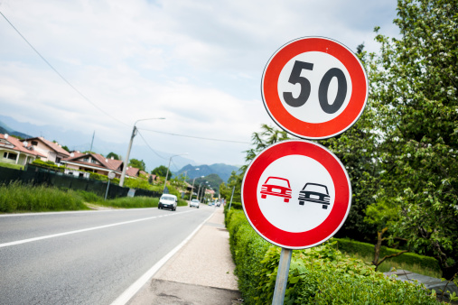 Speed limit 50 and  no overtaking italian roadsign