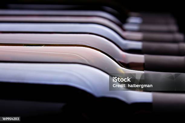 Row Of Wine Bottles Stock Photo - Download Image Now - Wine Bottle, Wine, Close-up