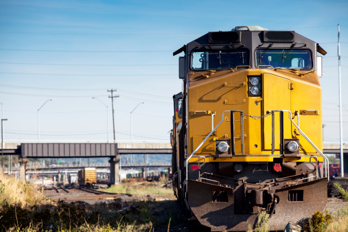 Evanston, WY - May 8, 2019: The Union Pacific Big Boy steam locomotive, wheel arrangement 4-8-8-4, is teamed up with 4-8-4, UP #844, on a double-header steam trip to commemorate the 150th Anniversary of the driving of the Golden Spike.  On a cold, wet and snowy morninging departure from Evanston, WY, the steam locomotives teamed up for one of the steamiest views ever captured!