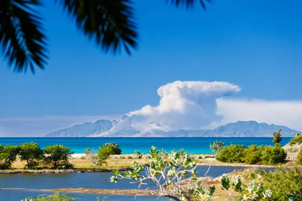 View to the active volcano in Montserrat with a large ash cloud.