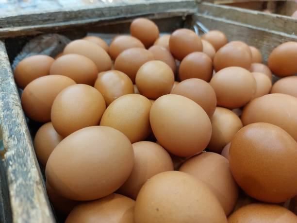 istock A batch of chicken eggs in a wooden box 1699555587