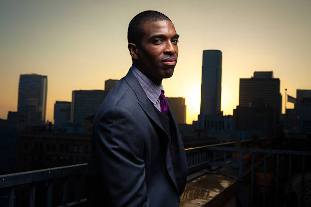 istock Black Businessman with City Skyline 169955655