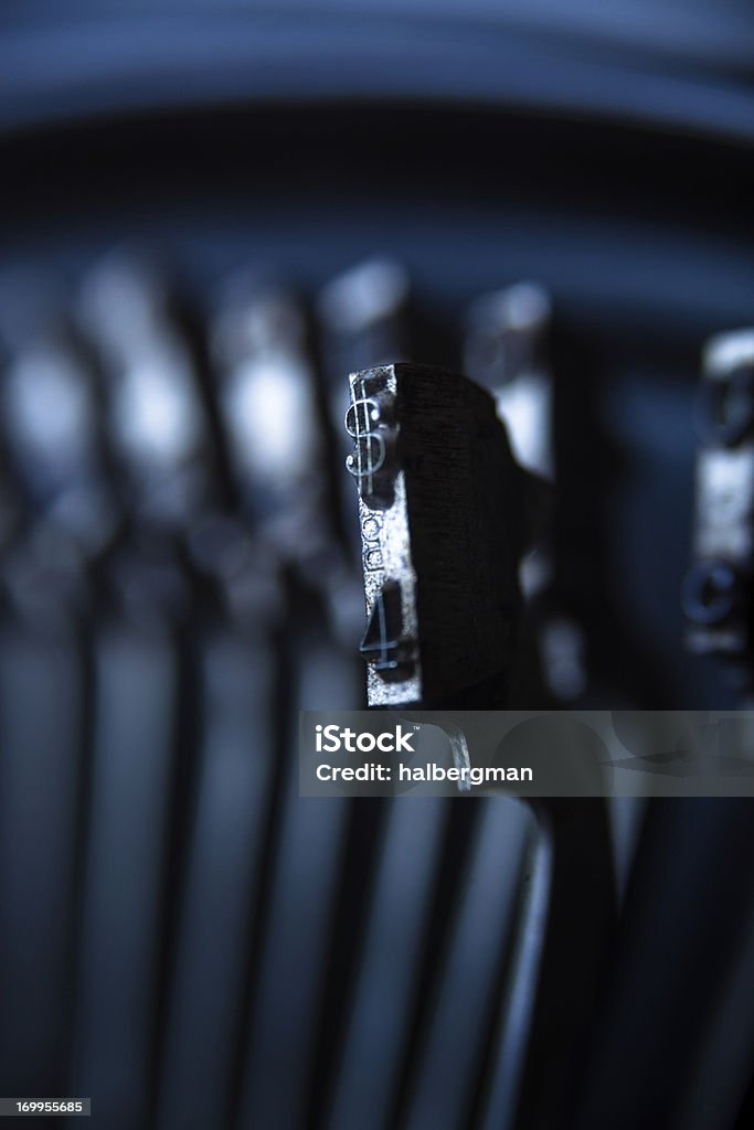 Dollar Sign Type Bar Macro closeup of a dollar sign type bar on a vintage typewriter Blue Stock Photo