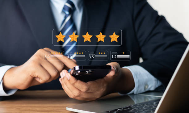istock Customer or User give rating to service experiences review satisfaction feedback survey on online application, Customer can evaluate quality of service leading to reputation ranking of business. 1699561149
