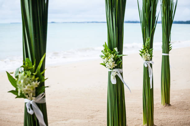 istock Floral arrangement at a wedding ceremony on beach. 1699561713