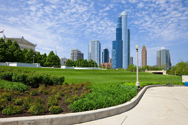 Chicago USA Lakefront Trail Grant Park Cityscape of Chicago with new apartments and the Field Museum visible on the left side. grant park stock pictures, royalty-free photos & images