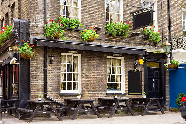 English Tavern, Pub Old English tavern in London, UK. pub stock pictures, royalty-free photos & images