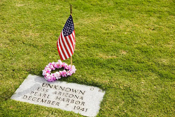 Memorial Day at a Punchbowl National Cemetery (aka National Memorial Cemetery of the Pacific) gravesite of an unknown person who died aboard the USS Arizona during the attack on Pearl Harbor on December 7, 1941.