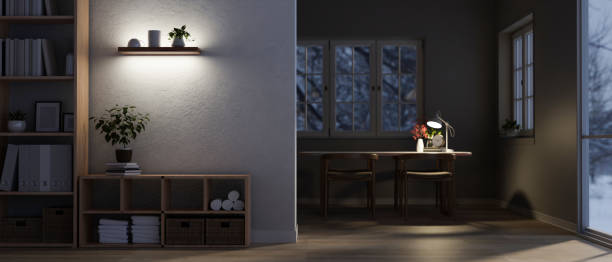 istock A modern spacious home living room and a dining room at night with a dining table. 1699584915