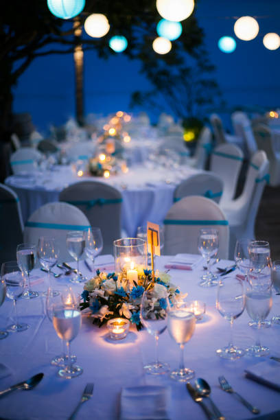 istock dinner table on the beach at Thailand 1699587133