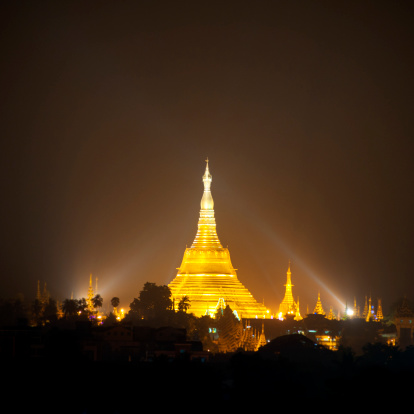 The Shwedagon Pagoda (Shwedagon Paya) in Yangon, Myanmar at night.