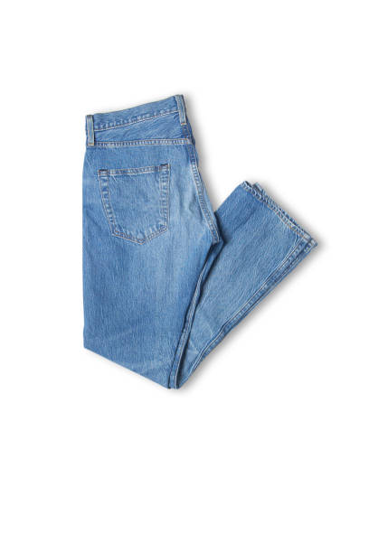 istock Denim texture in close up view with copy space isolate on white background with clipping path. Blue jeans pattern no seam with macro to preset about classic fashion cloths concept. Indigo color fabric 1699612998