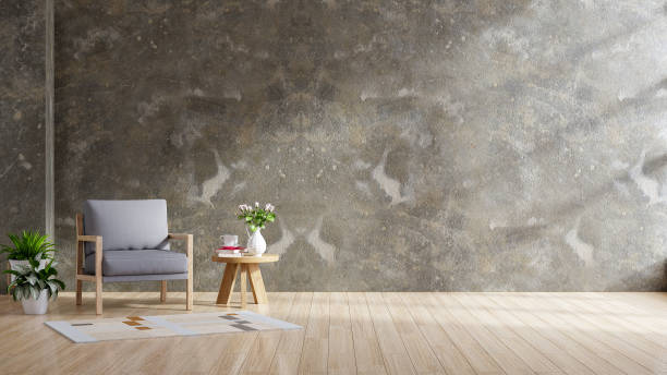 istock Style loft interior with gray armchair on dark cement wall 1699614557