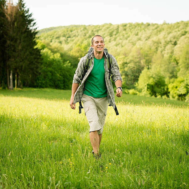 istock Smiling Men Hiking in The Nature 169962828