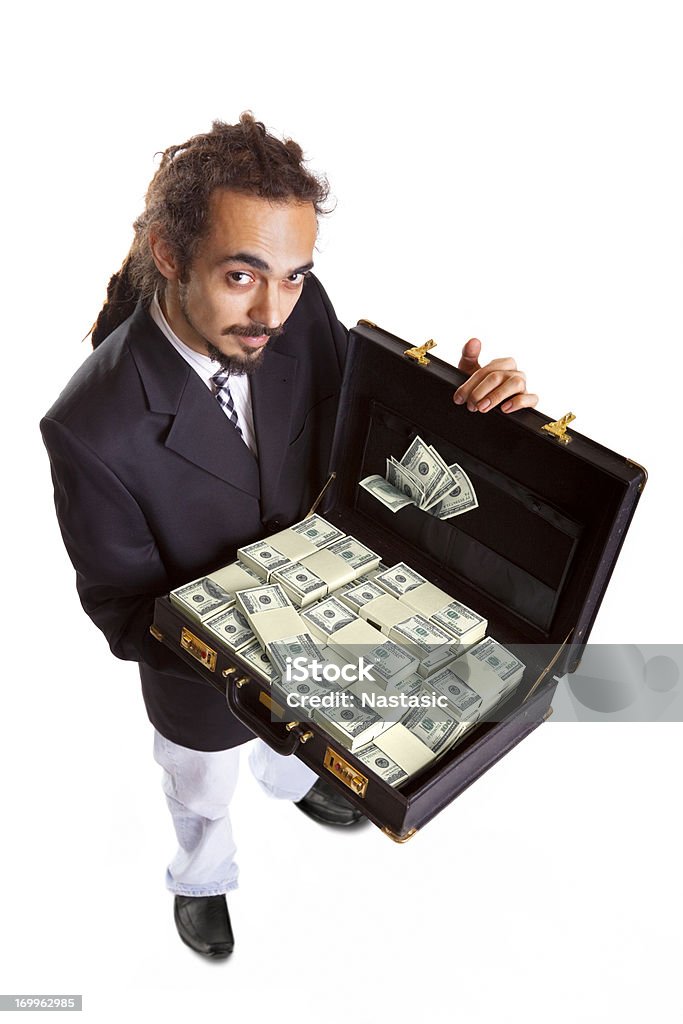 Money talk young businessman with dreadlocks holding briefcase with money, isolated on white Currency Stock Photo