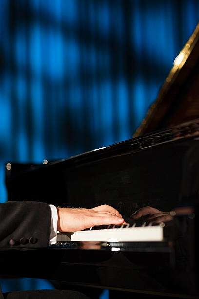 istock Hands of piano player 169968615