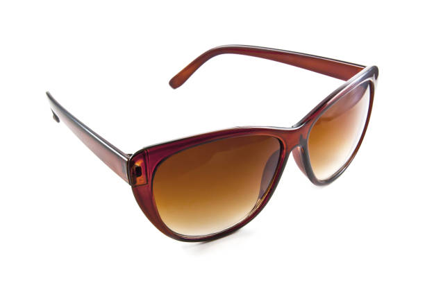 Stylish brown sunglasses on white background