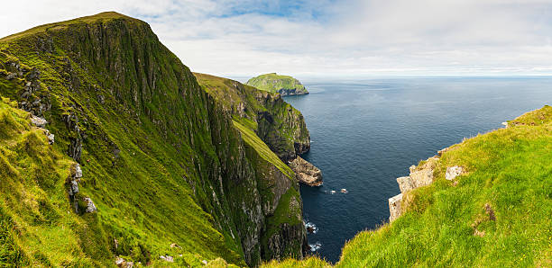 istock Scotland St Kilda sea cliffs Western Isles panorama 169968799
