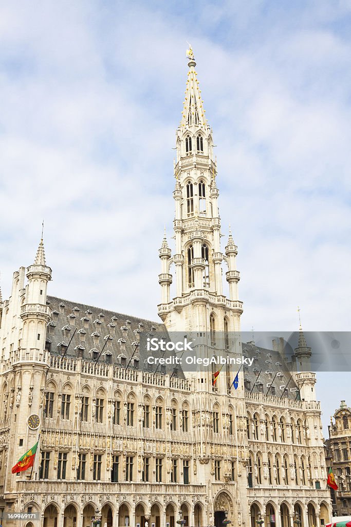 Town Hall (Hotel de Ville), Brussels. Town Hall (Hotel de Ville), Brussels, Belgium. The town Hall was built in stages between 1401 and 1455 and is a part of the Grand Place (Grote Markt) which is the central square and the most memorable landmark of Brussels. The Grand Place was designated by UNESCO as a World Heritage Site and was voted the most beautiful square in Europe in 2010. Architecture Stock Photo