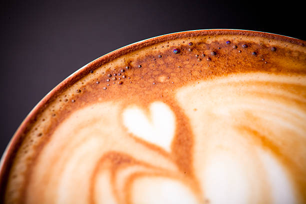 Detail shot of a cup of Mocha with a heart in it