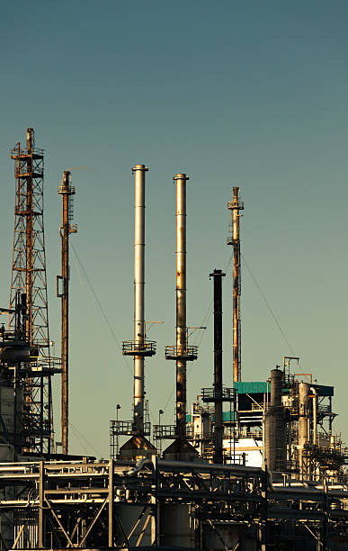istock Oil Refinery Smoke Stacks and Distillation Towers 169971029