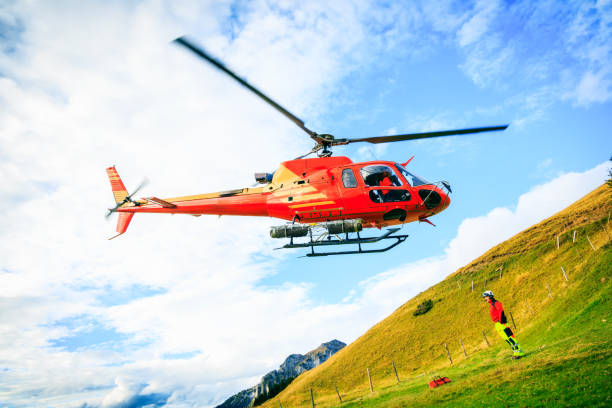 istock red helicopter in the swiss alps 169971367