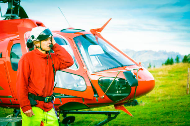 istock paramedic standing by his helicopter 169971576