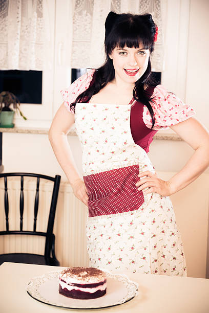 istock vintage girl baking a cake 169971592