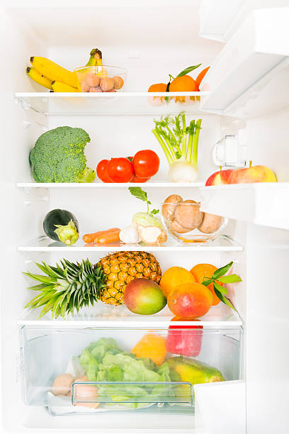 kühlschrank - refrigerator healthy eating mango fruit stock-fotos und bilder