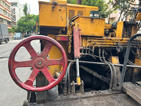 A bitumen paver parked for road construction in Bengaluru, India on September 25,2023