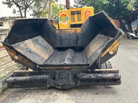 A bitumen paver parked for road construction in Bengaluru, India on September 25,2023