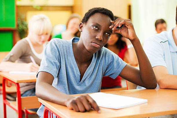 istock Teenage students sitting in the classroom. 169972263