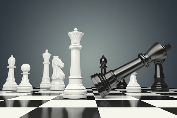 Falling King White queen knocking down black king. Conceptual illustration. chess board photos stock pictures, royalty-free photos & images