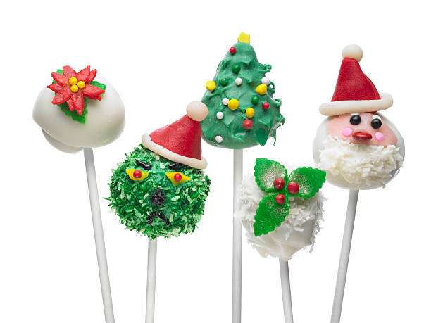 Five Christmas themed cake pops on sticks